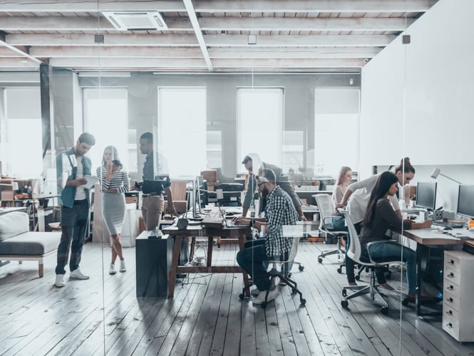 team members sitting in chairs