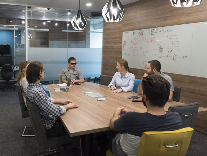 team having meeting in modern meeting room